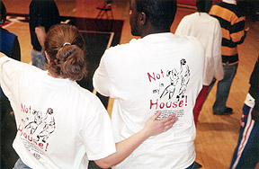 A woman explains adirections to a man at an MVP Training